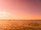 View on the people swimming and playing in the Balaton lake in Siofok, Hungary on a during the sunet on summer day