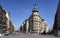 View of people walking at one of the famous city squares