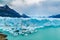 View of Perito Moreno Glacier with Iceberg floating in Argentina lake