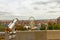 view from the Petersberg in Erfurt over the cathedral square during Oktoberfest with a telescope in the foreground