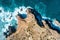 View of a picturesque beach with crystal blue waters, large rocks