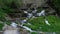 View of the picturesque Slovenskiye Klyuchi waterfall in Izborsk, Russia.