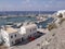 View of the pier with yachts, boats, ships. Vlychada, Santorini. Greece