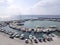 View of the pier with yachts, boats, ships. Vlychada, Santorini. Greece