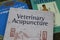 View on pile old english and chinese veterinary acupuncture books