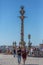 View at the Pillory of Porto city, a ornamented sculpture on plaza ,with tourists and blue sky