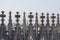 View through the pinnacles and spires of the gothic cathedral Duomo di Milano, Italy.