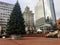 A view of pioneer courthouse square with a huge christmas tree during christmas in Portland, Oregon