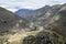 View of Pisac Archaeological Park and green mountains of the Sacred Valley of the Incas, Peru