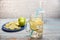 View of a pitcher of lemonade with iceview of a jug of lemonade with ice and lemon