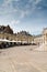 View of the Place de La Liberacion Square in the heart of the old town of Dijon with people dining out in the many restaurants