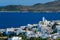 View of Plaka village with traditional Greek church. Milos island, Greece