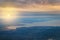 View from the plane to the island of Sakhalin, the mountains and the sea with the seaport.