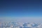View from the plane to snowy greenland. Landscape of snowy mountains of Greenland