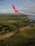 View from the plane window to the African green fields with trees