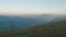 View of plateau Bermamyth with clouds over it in early morning while sun rising. Cold summer morning