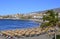 View of Playa de Torviscas beach with black volcanic sand on the south of Tenerife,Canary Islands,Spain.