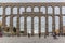 View at the Plaza Azoguejo and Towering Roman aqueduct & grand landmark monument of Segovia, on Segovia downtown