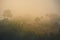 View point of clouds and tents on a hills at sunrise