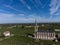 View on Pomerol village, production of red Bordeaux wine, Merlot or Cabernet Sauvignon red wine grapes on cru class vineyards in