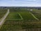 View on Pomerol village, production of red Bordeaux wine, Merlot or Cabernet Sauvignon red wine grapes on cru class vineyards in