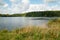 The view of a pond in the countryside in summer