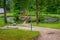 View of pond with small island of Love and wooden gazebo in the castle park.