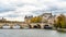 View from Pont des arts and Seine river during Autumn season in the afternoon cloudy day . One of the most important bridge in