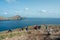 view of Ponta de Sao Lourenco in east coast of Madeira, Portugal, Europe with a group of people watching it