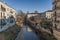 View from Ponte San Michele, ancient stone bridge in the historic city center - Vicenza, Italy