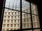 View of the Ponte Tower in south Africa seen through a window