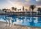 View of the pool at the resort at sunset