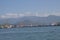 view of the port of Batumi with and cloudy mountains on the coast of the Black sea in a sunny day