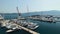 View of the Porto Montenegro marina in Tivat, yachts and boats at the pier, crane