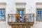 View of a portuguese traditional balcony, with retro bicycle, on medieval village of Ã“bidos