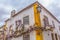 View of a Portuguese vernacular building with climb plant on facade, on medieval village of Ã“bidos, in Portugal