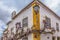 View of a Portuguese vernacular building with climb plant on facade, on medieval village of Ã“bidos, in Portugal