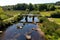 View from Postbridge clapper bridge Dartmoor National Park Devon England UK