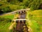 A view of Postbridge Clapper Bridge in Dartmoor National Park is a vast moorland in the county of Devon, in southwest England