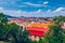 View of Prague Castle over red roof from Vysehrad area at sunset lights, Prague, Czech Republic. Scenic view of Prague city,