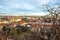 View of Prague over houses with red roofs. Amazing view from above at old historical quarter. Prague, Czech Republic. Prague is f