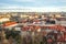 View of Prague over houses with red roofs. Amazing view from above at old historical quarter. Prague, Czech Republic. Prague is f