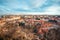 View of Prague over houses with red roofs. Amazing view from above at old historical quarter. Prague, Czech Republic. Prague is f