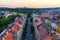 View of Prague taken from Nuselsky bridge (Nusle Bridge). Famous Vysehrad fort is behind it with Basilica of St. Peter and St.