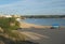 View of Praia da Franquia sand beach at Vila Nova de Milfontes with Mira river firth, Forte de Milfontes and green