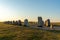 View of the prehistoric Ales Stenar ship setting on the southern coast of Sweden at sunset