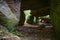 View into a prehistoric megalithic tomb or dolmen, an excavated and reconstructed passage grave from larges stones in the forest