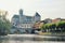 View of Presbytere de la Paroisse and the river Loign,  Moret sur Loing, France