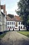 View of the Princely Beguinage Ten Wijngaarde with white-colored house fronts