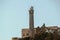 View on Prison Alcatraz. Lighthouse on blue sky background.  Alcatraz island background. San Francisco.